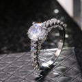 Silver Tone Raised Solitaire Ring with Clear Stone Halo view 2