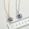 Fourteen Millimeter Crystal Evil Eye Pendant Necklaces in Two Finishes view 4
