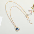 Fourteen Millimeter Crystal Evil Eye Pendant Necklaces in Two Finishes view 5