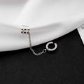 Three Silver Tone Hoop and Ear Cuff Chain Earrings view 3