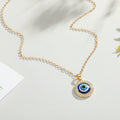 Fourteen Millimeter Crystal Evil Eye Pendant Necklaces in Two Finishes view 2