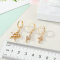 Gold Tone Crystal Huggie Drop Earrings in Three Symbol Designs view 4