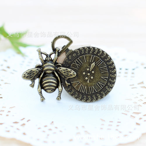 Bee and Clock Face Metal Charm shown in front detail view