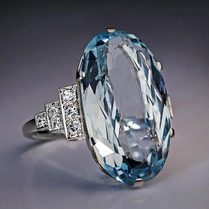 Oversized Pale Blue Oval Solitaire Ring In Polished Silver Tone
