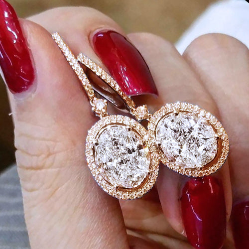 Gold and Silver Tone Double Circle Drop Earrings with Clear Stone Accents shown in front view