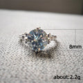Silver Tone Twisted Ring with Light Blue Round Stone view 5