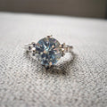 Silver Tone Twisted Ring with Light Blue Round Stone view 6