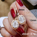 Gold and Silver Tone Double Circle Drop Earrings with Clear Stone Accents view 5