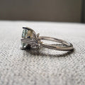 Silver Tone Twisted Ring with Light Blue Round Stone view 2