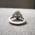 Silver Tone Twisted Ring with Light Blue Round Stone view 3