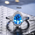 Silver Tone Halo Ring with Blue or Iridescent Oval Stone view 5