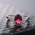 Red Oval Halo Three-Stone Ring In Polished Silver Tone view 6