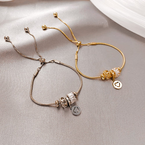 slider bracelet with crystal beads and a cutout heart charm in a second styled product view