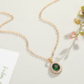 Gold Tone Oval Crystal Halo Pendant Necklaces in Three Colors view 3