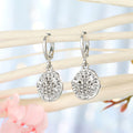 Hamsa and Evil Eye Medallion Huggie Drop Earrings in Four Finishes view 6