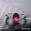 Red Oval Halo Three-Stone Ring In Polished Silver Tone view 5