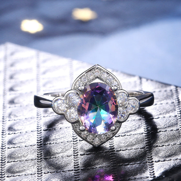 Silver Tone Halo Ring with Blue or Iridescent Oval Stone