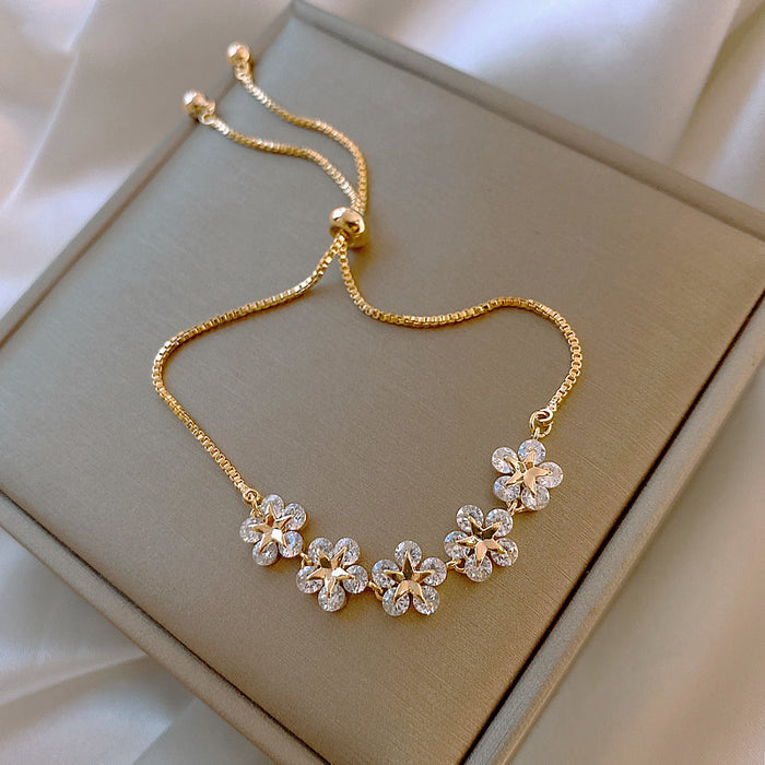 Gold Tone Five Flower Clear Crystal Adjustable Slider Bracelet