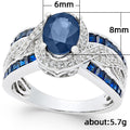 Blue Oval Center Stone Crossover Pavé Ring in Silver Tone view 5