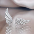 Wing Shape Stud Earrings in Silver and Gold Tones Jewelry Accessory view 1