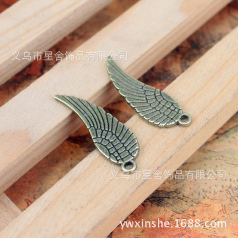 Double-Sided Wing Feather Alloy Charm Pendant 30x9mm