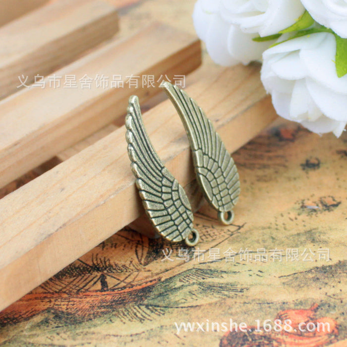 Double-Sided Wing Feather Alloy Charm Pendant 30x9mm