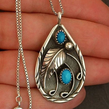 Turquoise Teardrop Feather Pendant Necklace in Silver Tone