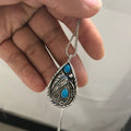 Turquoise Teardrop Feather Pendant Necklace in Silver Tone view 3