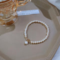 White Pearl Like Strand Bracelet With Single Drop Accent view 4