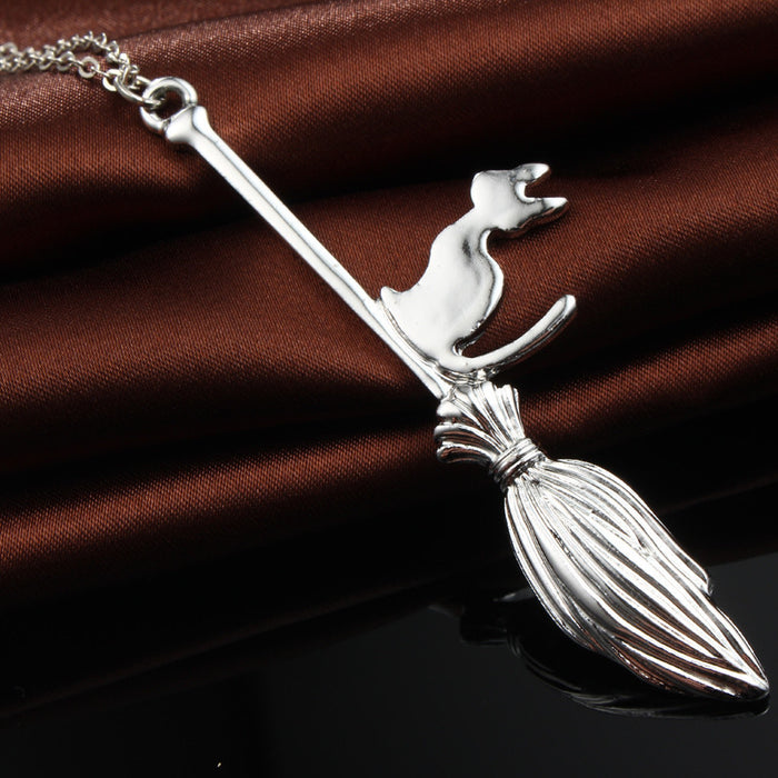 Witch Riding Broom Pendant Necklace in Gold or Silver Tone