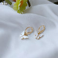 Gold Huggie Hoop Earrings Pink White Butterfly Charms view 6