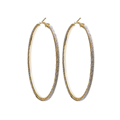 Primary supplied view of matte oversized round hoop earrings