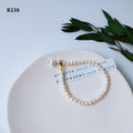 White Pearl Like Strand Bracelet With Single Drop Accent view 3