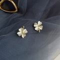 Geometric Cat Eye Earring Collection with Sculpted Polished Metal Details view 2