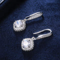 Round Halo Long Hook Earrings In Nine Stone And Metal Variants view 3