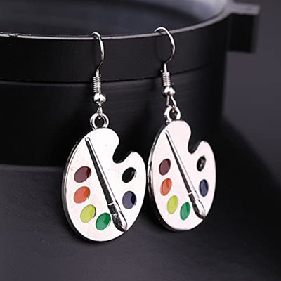 Pair silver artist palette multicolor dangle earrings on dark stand