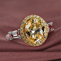Two Tone Oval Halo Ring with Champagne Center Stone view 1