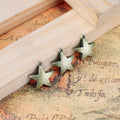 Thick Five Point Star Metal Charms in Four Vintage Tone Finishes view 2