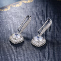 Round Halo Long Hook Earrings In Nine Stone And Metal Variants view 2
