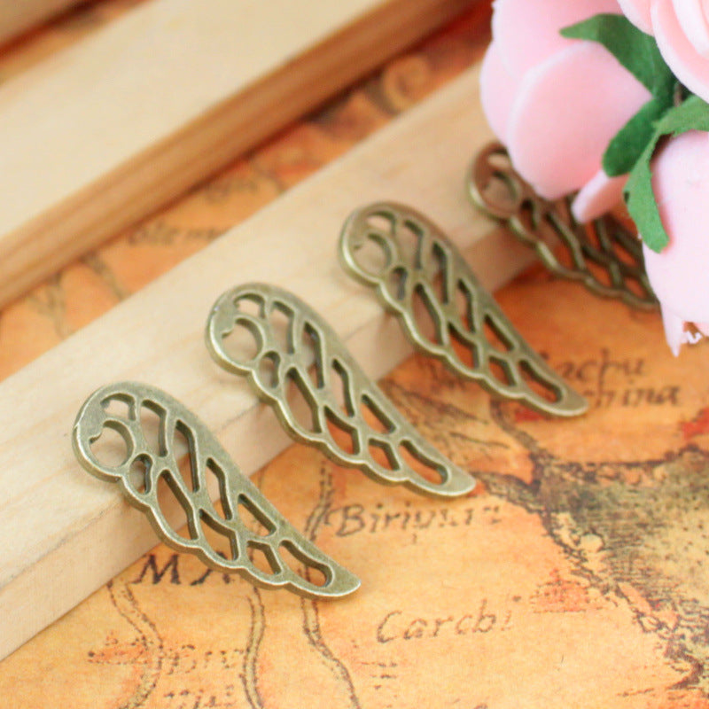 Vintage Hollow Wing Alloy Charm Pendant 24x9mm