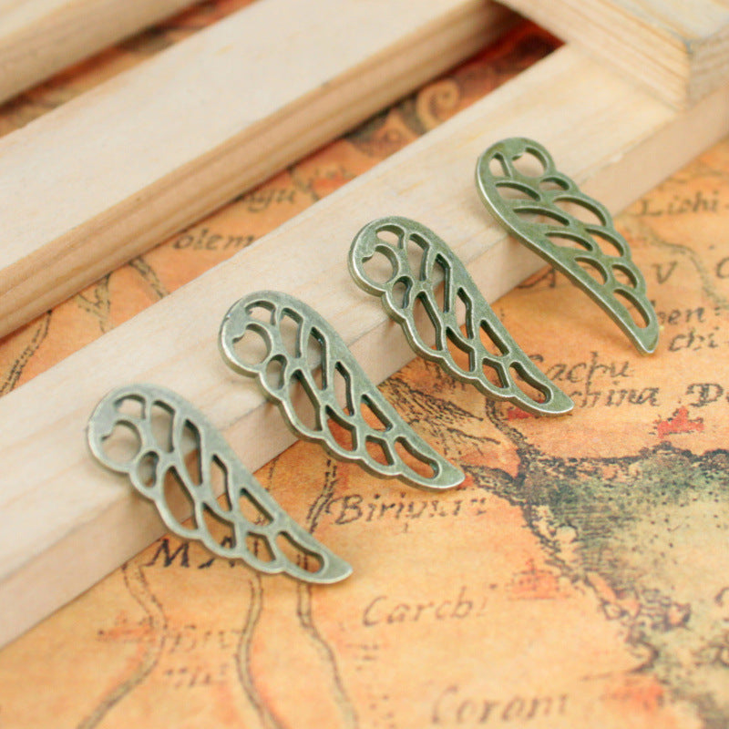 Vintage Hollow Wing Alloy Charm Pendant 24x9mm