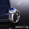Blue Oval Stone Double Halo Silver Tone Ring Jewelry Accessory view 5