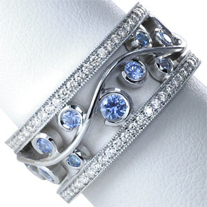 Silver Tone Blue Crystal Openwork Scroll Ring angled detail