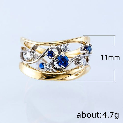 Blue and Clear Stone Gold Tone Wide Ring shown in alternate angle