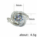 Swirl Halo Round Stone Ring In Polished Silver Tone view 5