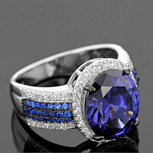 Blue Oval Stone Double Halo Silver Tone Ring shown in alternate angle