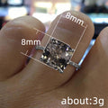 Square Center Stone Pavé Band Ring In Two Metal Tones view 5