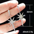 Silver Tone Eight Point Star Drop Earrings with Clear Stones view 5