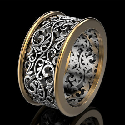 Two-tone gold and silver openwork filigree wide band ring angled