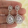 Double Teardrop Crystal Dangle Earrings in Silver Tone view 2